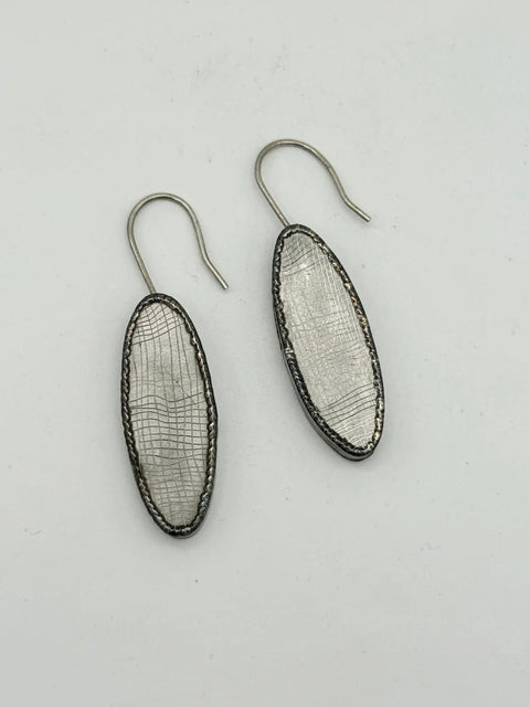 Everett Hoffman welded spinner earrings